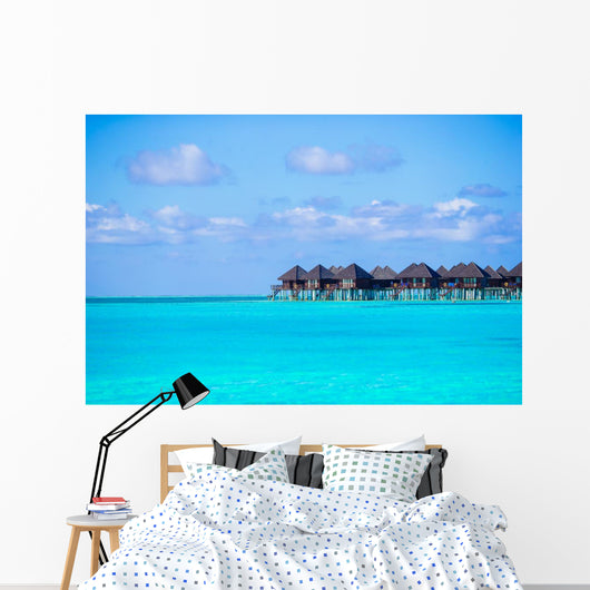 Water villas, bungalows on ideal perfect tropical island Wall Mural
