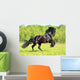 Black Frieasian horse runs gallop in freedom Wall Mural