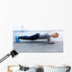 Young athlete is doing push ups Wall Mural