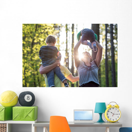 Parents Playing with Their Wall Decal