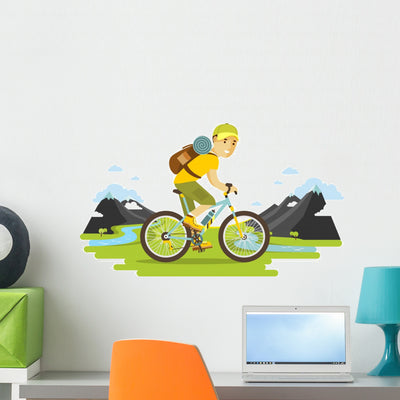 Young Bicyclist Man Riding Wall Decal shown on a wall