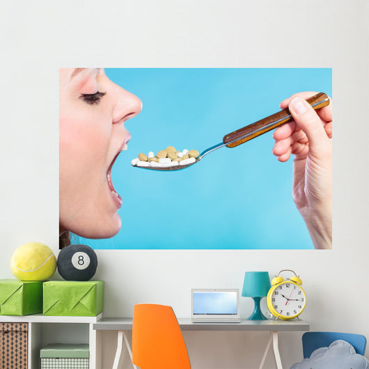 Young Woman Eating Pills Wall Decal