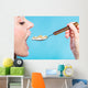 Young Woman Eating Pills Wall Decal