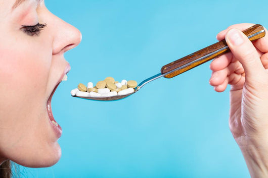Young Woman Eating Pills Wall Decal