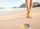 Woman Walking Sandy Beach Wall Decal