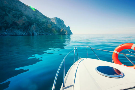 Private Boat near Mountains Wall Decal