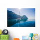 Yacht sailing along the shore the sea in calm weather. Wall Mural