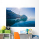 Yacht sailing along the shore the sea in calm weather. Wall Mural