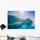 Yacht sailing along the shore the sea in calm weather. Wall Mural