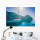 Yacht sailing along the shore the sea in calm weather. Wall Mural