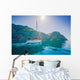Yacht sailing along the shore the sea in calm weather. Wall Mural