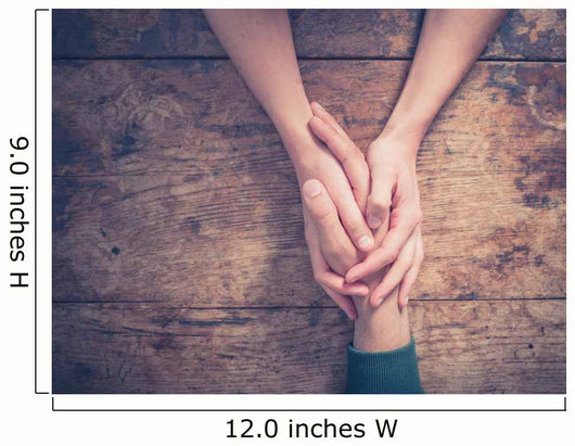 Man and woman holding hands at a table Wall Mural