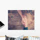 Man and woman holding hands at a table Wall Mural