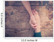 Man and woman holding hands at a table Wall Mural