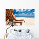 Woman Beach Holding Sunglasses Wall Decal