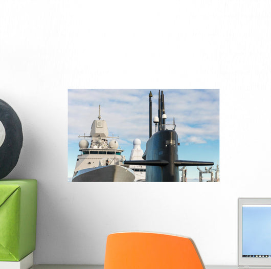 Naval fleet. Submarine and warships with guns. Wall Mural