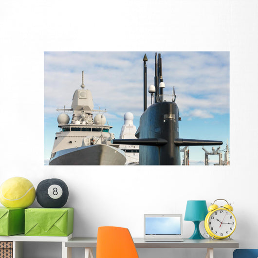 Naval fleet. Submarine and warships with guns. Wall Mural