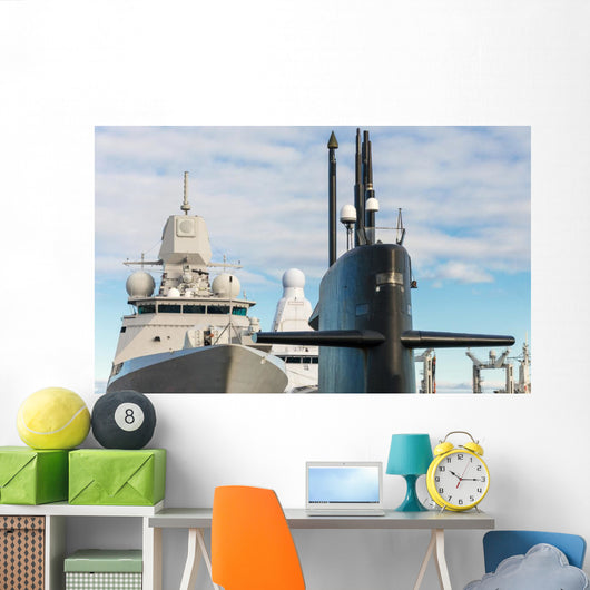 Naval fleet. Submarine and warships with guns. Wall Mural
