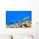 Underwater world with corals and tropical fish. Wall Mural