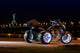 Black trike standing on the night street Wall Mural