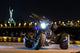 Black trike standing on the night street Wall Mural