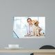 Veterinarian. Vet using technology with a little dog - isolated Wall Mural
