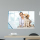 Veterinarian. Vet using technology with a little dog - isolated Wall Mural