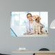 Veterinarian. Vet using technology with a little dog - isolated Wall Mural