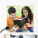 Two Teens Share Bible Wall Decal