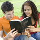 Two Teens Share Bible Wall Decal