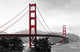 Golden Gate Bridge, red pop on a black and white background Wall Mural