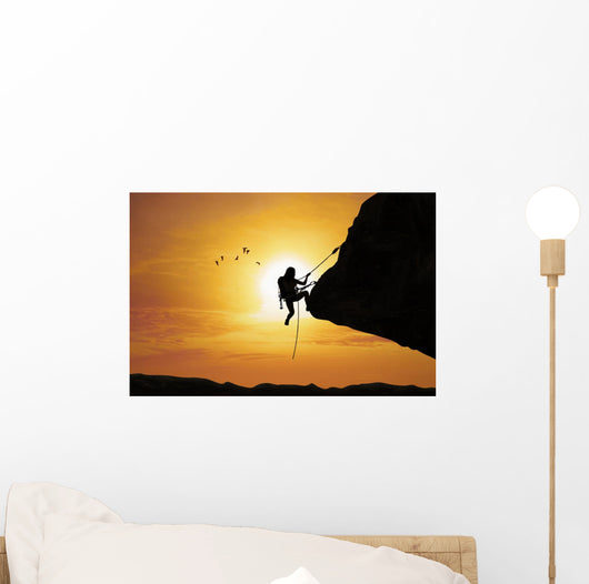 Silhouette Woman Climbing Rock Wall Decal