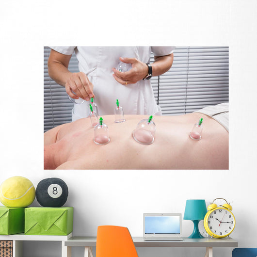 Close-up Therapist's Hand Placing Wall Decal