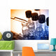 Laboratory research, dropping liquid to test tube  Wall Mural