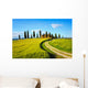 Tuscany, farmland, cypress trees and white road on sunset. Siena Wall Mural