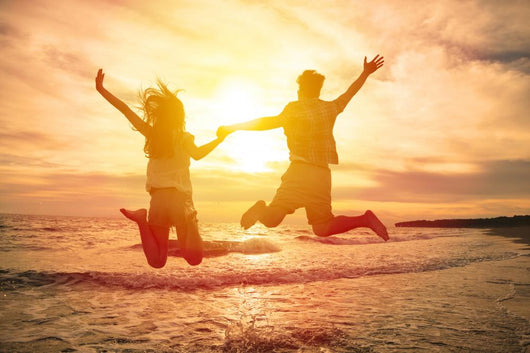 Young Happy Couple Jumping Wall Decal