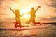 Young Happy Couple Jumping Wall Decal