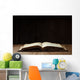 Image of an old Holy Bible on wooden background in a dark space Wall Mural
