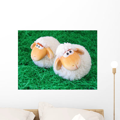 Two Little Toy Sheep Wall Decal shown on a wall