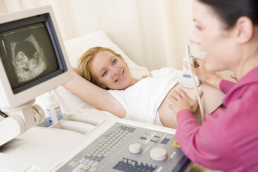 Pregnant Woman Getting Ultrasound Wall Decal
