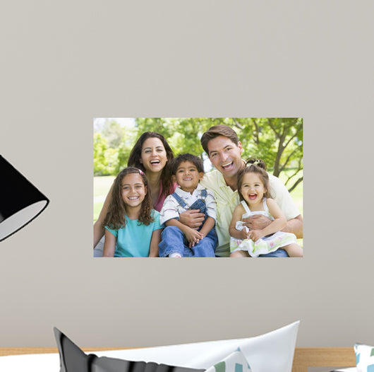 Laughing Family Sitting Outdoors Wall Decal