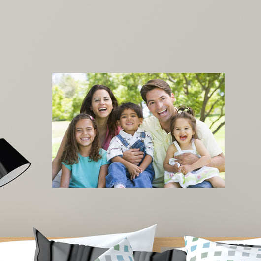 Laughing Family Sitting Outdoors Wall Decal