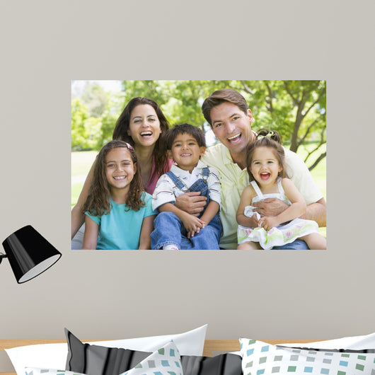 Laughing Family Sitting Outdoors Wall Decal