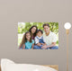 Smiling Family Sitting Outdoors Wall Decal