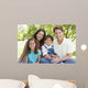 Smiling Family Sitting Outdoors Wall Decal