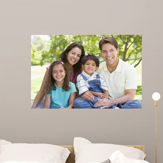 Smiling Family Sitting Outdoors Wall Decal