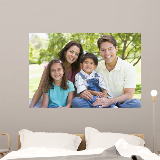 Smiling Family Sitting Outdoors Wall Decal