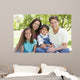 Smiling Family Sitting Outdoors Wall Decal