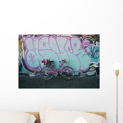 Bicycle with Flowers Graffiti Wall Decal shown on a wall