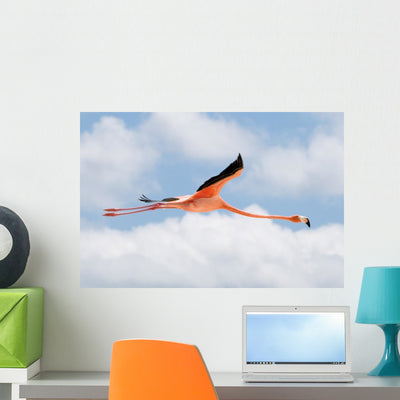 Flamingo Flight Wall Decal shown on a wall